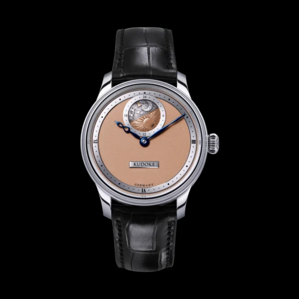 Kudoke 2 - Salmon Kudoke 2 – Salmon front view showing 24-hour sky disc and infinity hour hand