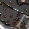 Emmanuel Bouchet Complication One Aleph White Gold Green Dial Details 2 Emmanuel Bouchet EB63E movement detail with hand-finished bridges and balance assembly