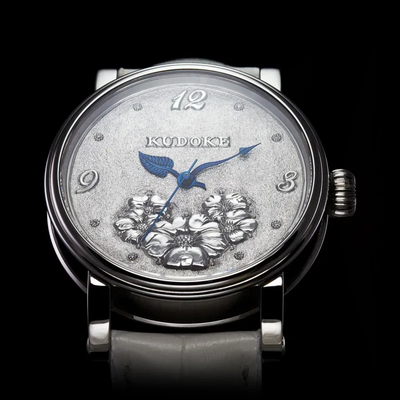 Kudoke White Flower 38mm stainless steel watch with sterling silver diamond dial and blued leaf-shaped hands