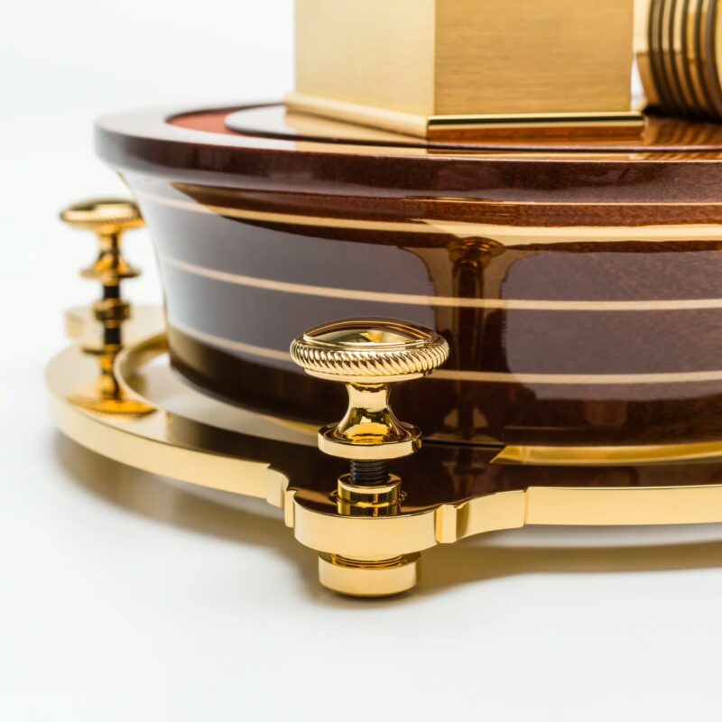 Polished sapele wood base with maple inlays and gold-plated support feet under high-gloss finish