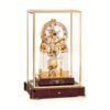 Matthias Naeschke NT 12 Table Clock in glass canopy with cherry wood base and gold mechanical movement